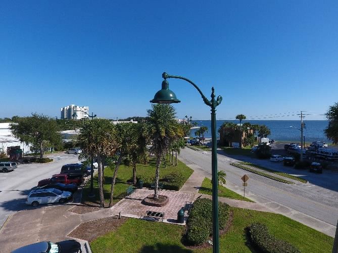 Aerial photo showing a parking lot light pole.