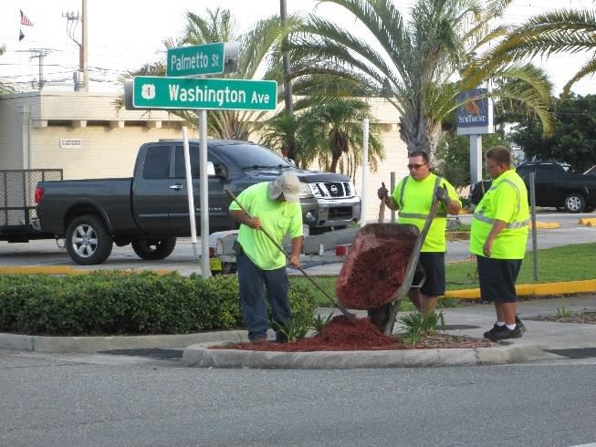 Photo of workers doing landscaping.
